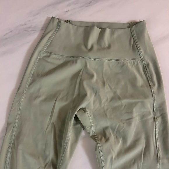 Almost brand new alphalete leggings. Size Md. Medium compression. Sage green. - Picture 1 of 5